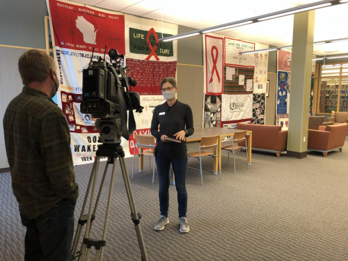 Madison Channel 3000 brought a news crew to get film of the quilts and interview Head of Library Services Jeni Schomber, who is the one who coordinated this project.