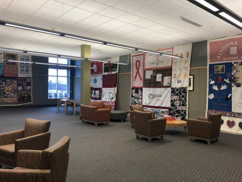 The six quilt panels hung from ceiling to floor.
