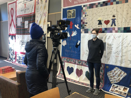 Rockford Channel WTVO-17 brought a news crew to get film of the quilts and interview Head of Library Services Jeni Schomber, who is the one who coordinated this project, for a feature story.